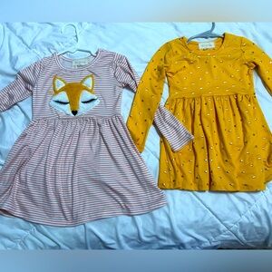 2 btween dresses.Material -Lightweight. Matching. Color yellow,gold,white. 2T